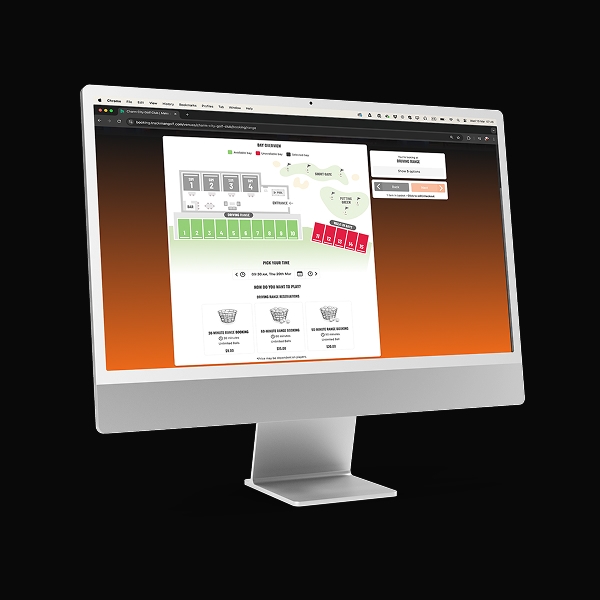 Computer monitor displaying Trackman booking and payments interface